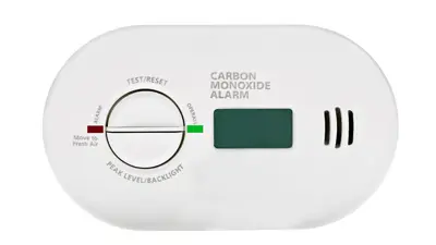 Close up image of a carbon monoxide alarm on white background.