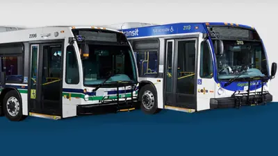Two Niagara Region transit buses parked side by side.