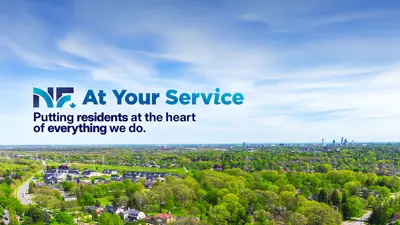 Niagara Falls At Your Service graphic showing city skyline.