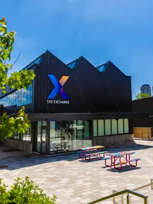 Exterior of the Niagara Falls Exchange building on a summer day.
